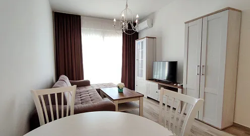 Apartments in a complex with a swimming pool on the first line by the sea